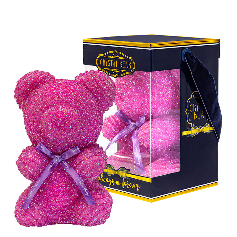 This depicts a glistening purple crystal bear with a purple ribbon around its neck that says "Always and Forever." It's encased in a clear box with a navy and gold-trimmed base and a "CRYSTAL BEAR" label.