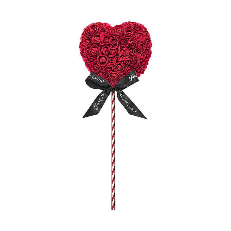 A heart-shaped lollipop with burgundy flowers, standing on a rburgundy striped stick, and adorned with a black ribbon reading "Just for you." The perfect gift for anniversaries, birthdays, graduations, Christmas, Valentine's, gender reveal and more. A timeless, romantic gift and a beautiful decoration. The durable nature of the materials make it a lasting memento for any special occasion.