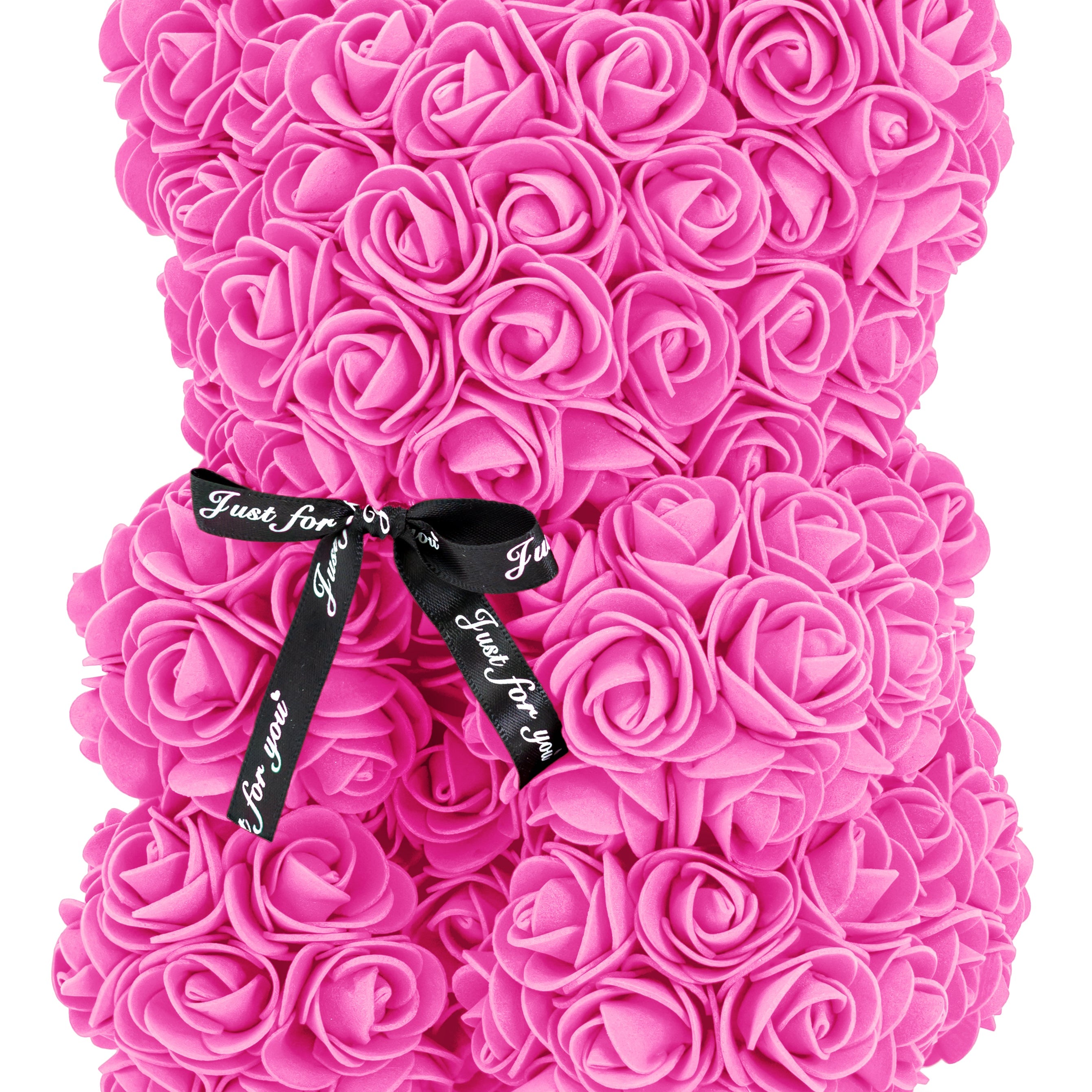 A bear shaped product covered in foam roses in the color pink.