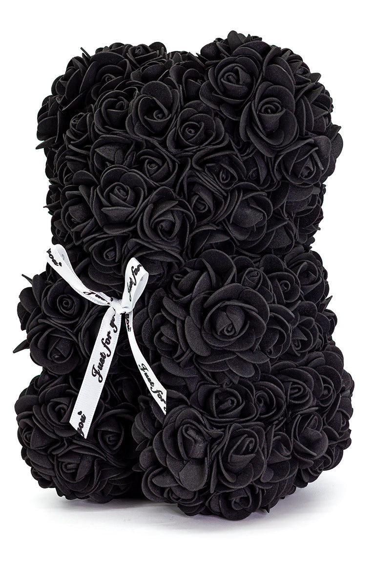 A bear shaped product covered in foam roses in the color black.