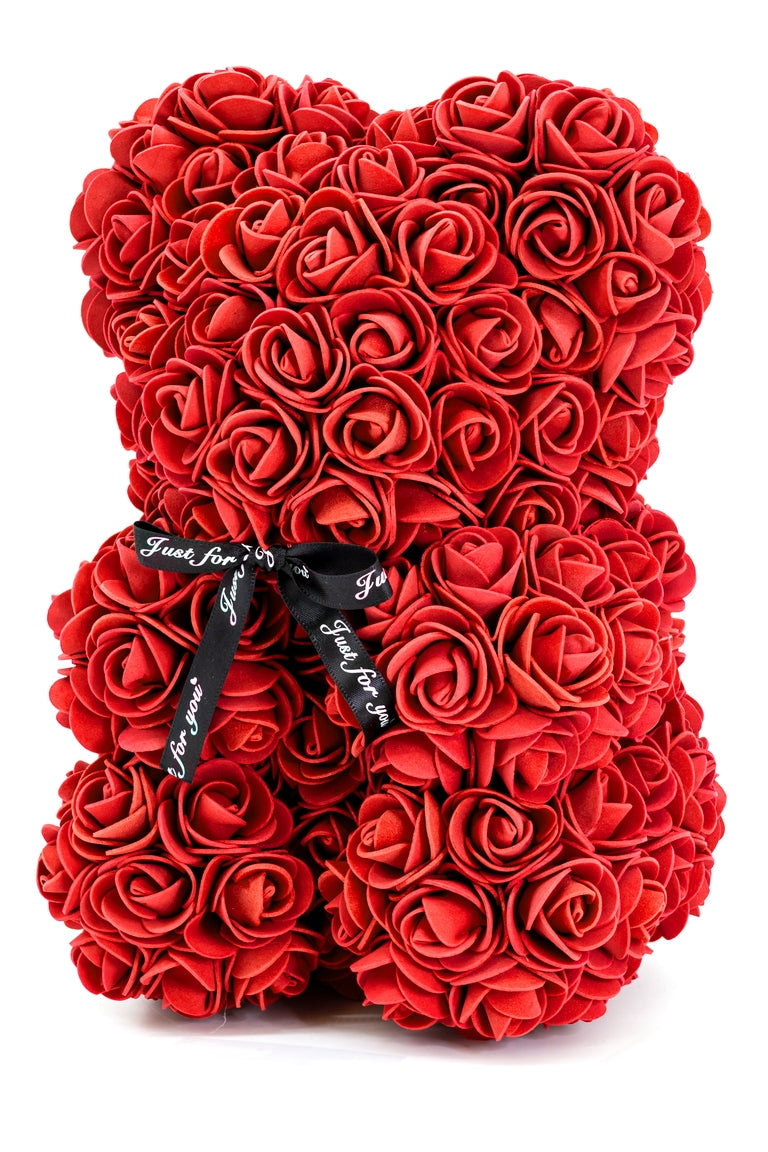 A front view of the bear shaped product covered in foam roses in the color of red.