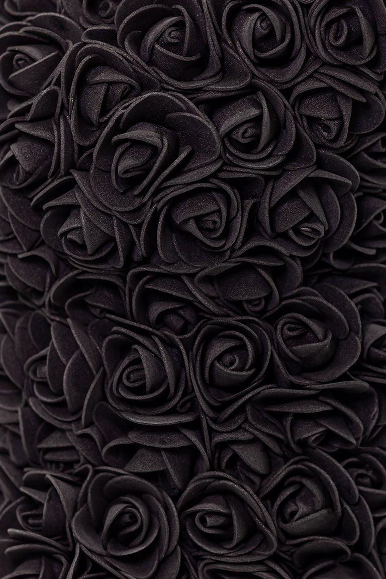 A close up view of the foam roses in black