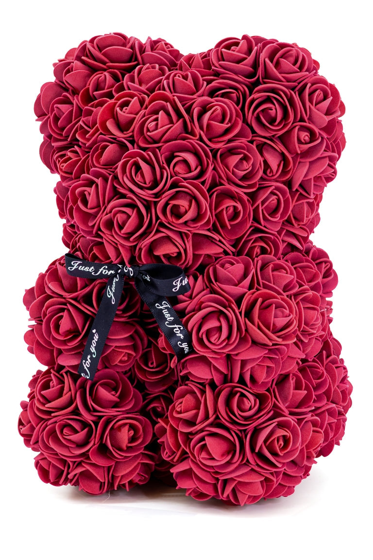 A front view of the bear shaped product covered in foam roses in the color of burgundy.